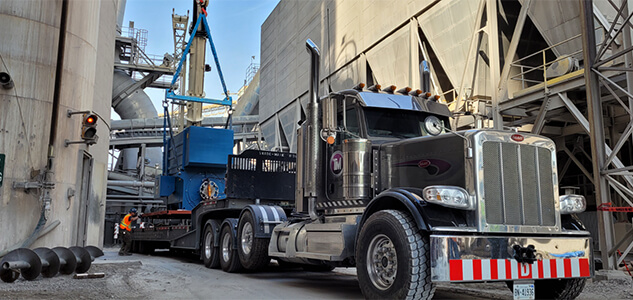 Trade-Mark trucks moving equipment