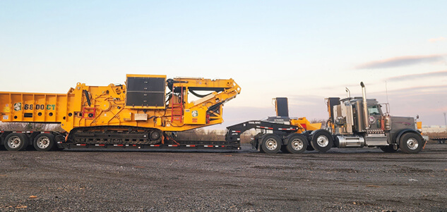 Trade-Mark trucks moving equipment
